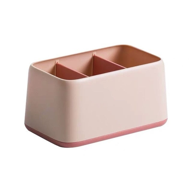 minimalist desktop organizer with three sections in pink and salmon color