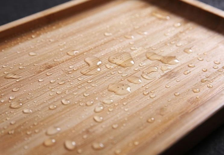 wooden bamboo serving tray has water resistant coating for easy washing