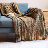 colorful brown bohemian throw blanket on sofa in living room
