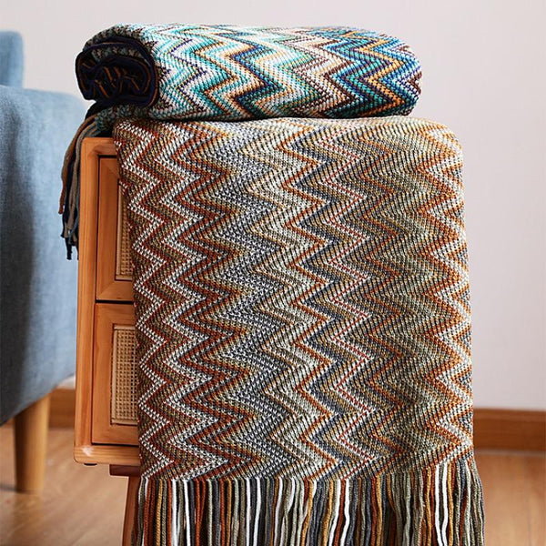 brown bohemian throw blanket draped over table