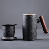 black ceramic tea mug with infuser and lid