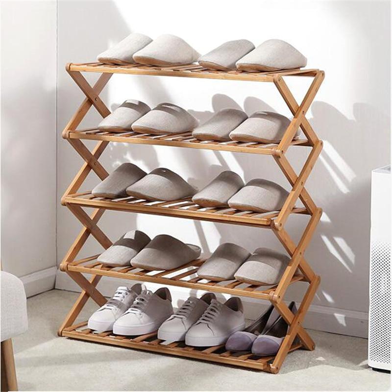 five layer foldable bamboo shoe rack in room