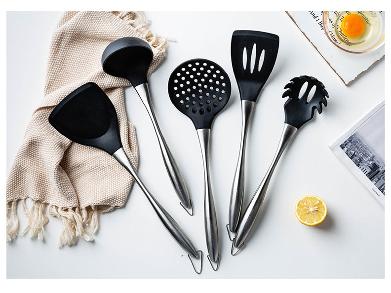 kitchen tool set features shovel, soup spoon, colander, spatula, and noodle spoon