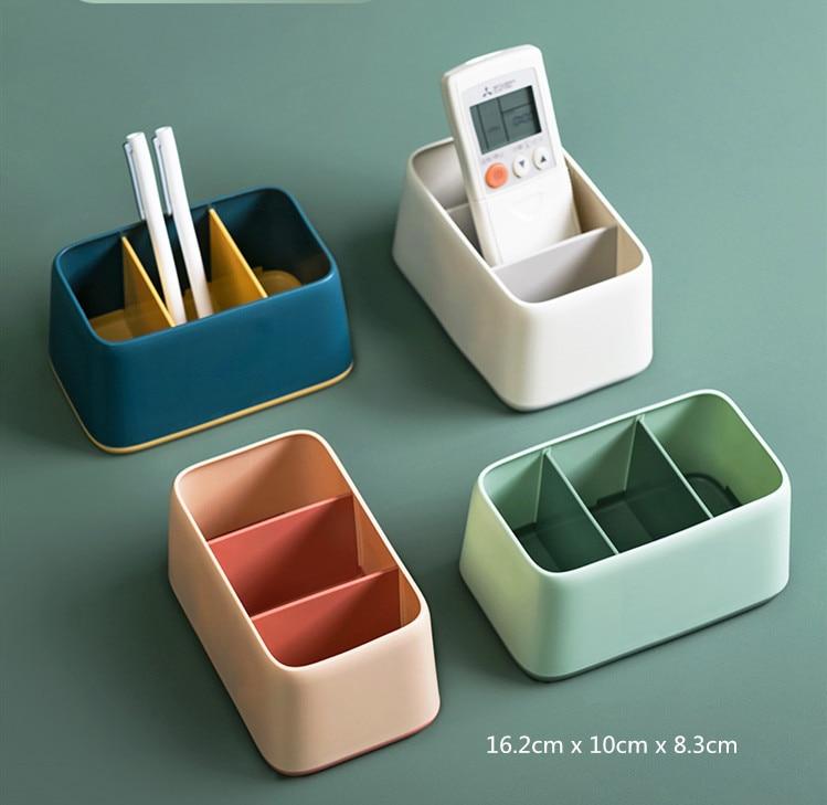 four minimalist desktop organizers with dual color design on green backdrop