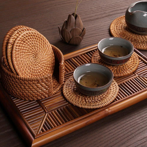 rattan coasters on serving tray with tea bowls