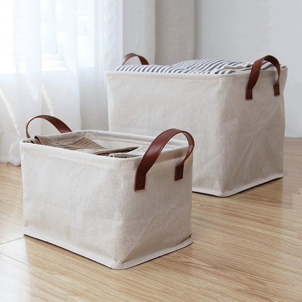coal and cove linen laundry baskets with leather handles