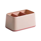 minimalist desktop organizer with three sections in pink and salmon color