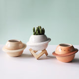 three ceramic flower pots for small house plants and succulents