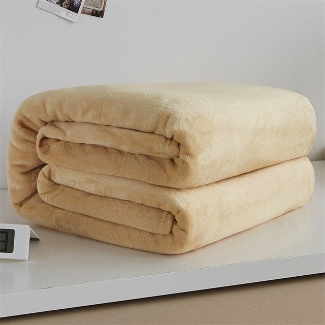 beige coral fleece blanket provides warmth and comfort for cool days
